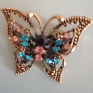 Vintage Gold and Blue Brooch with Intricate Design